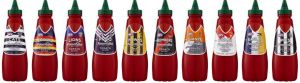 Each of the tomato sauce bottles features a different AFL team jersey.